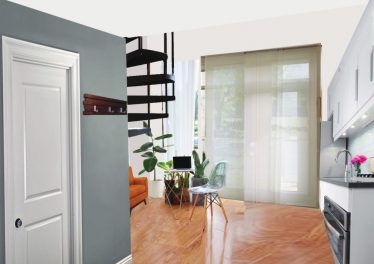 Living room with spiral staircase to loft