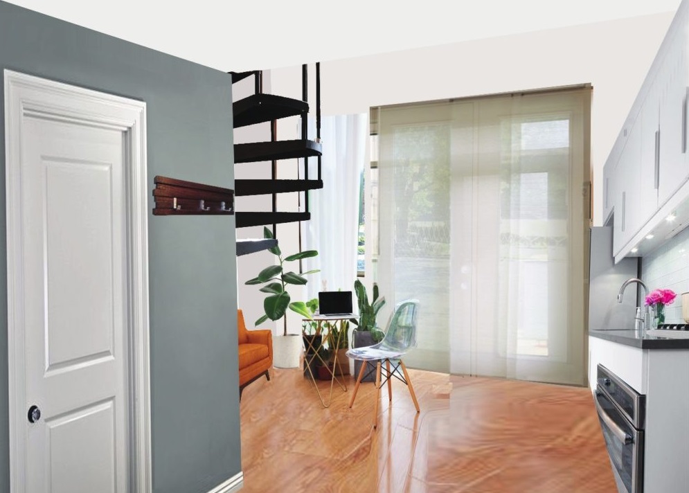Living room with spiral staircase to loft